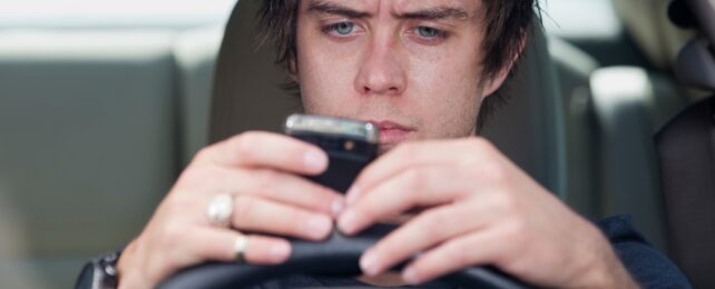 Teen texting while driving