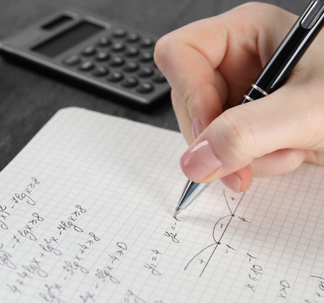 maths written on note pad