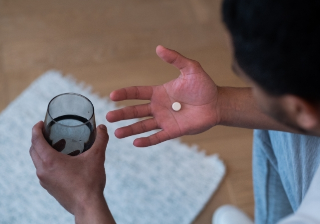man taking pill