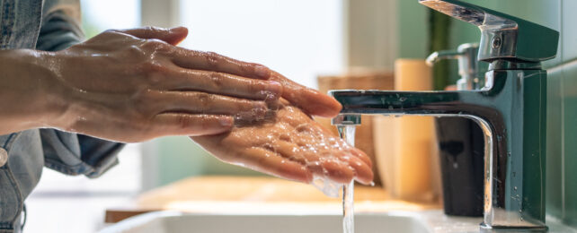 person washing hands