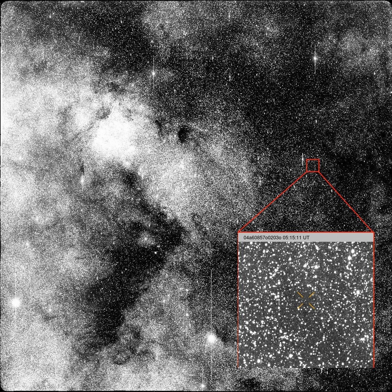 Dense field of stars in black and white with insert showing close up of one area