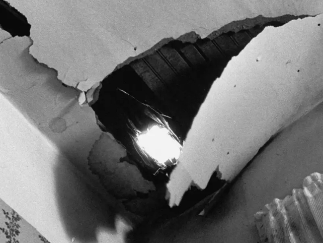 Damage to ceiling from first known meteorite that struck human