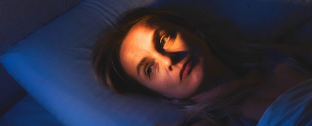 Woman lying awake