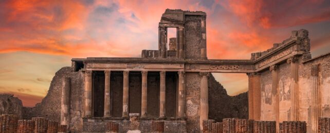 Pompeii basilica under a red sunset