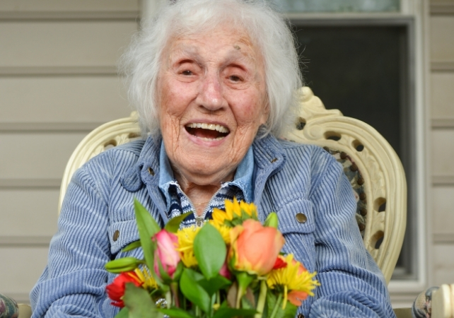 Centenarian with flowers