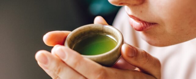 woman drinking green tea