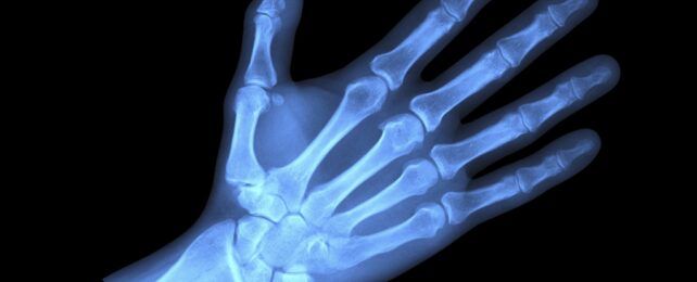 Glowy blue hand x-ray illustration