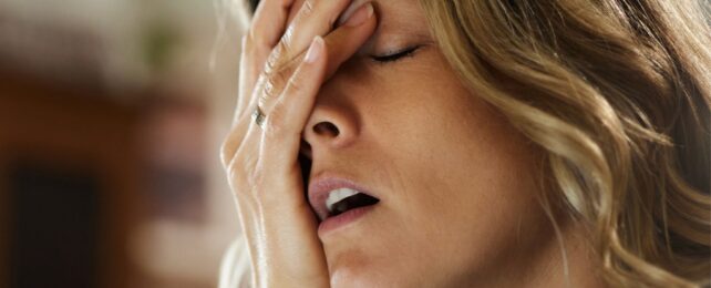 woman looking exhausted