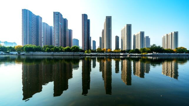 City Reflected In Water