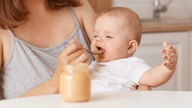 Baby being fed