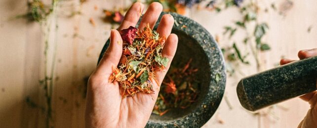 Grinding herbs with mortar