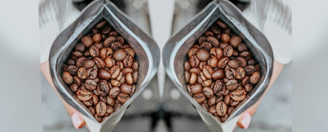 Aerial view of two open packs of coffee beans