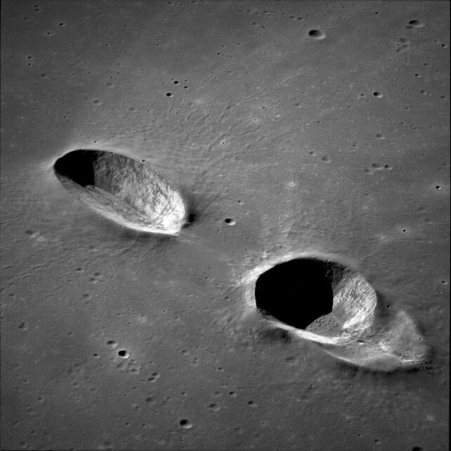 Two craters formed by low angle impacts