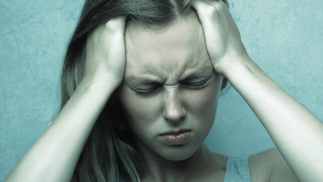 woman with a migraine