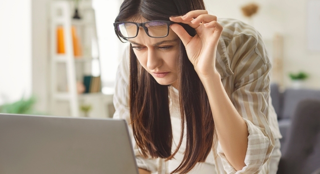 woman lifting glasses