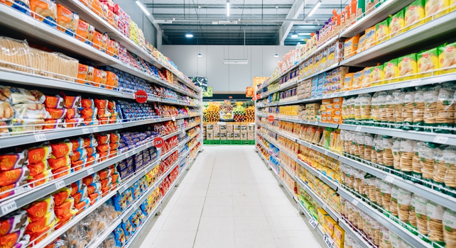 supermarket shelves stocked with processed foods