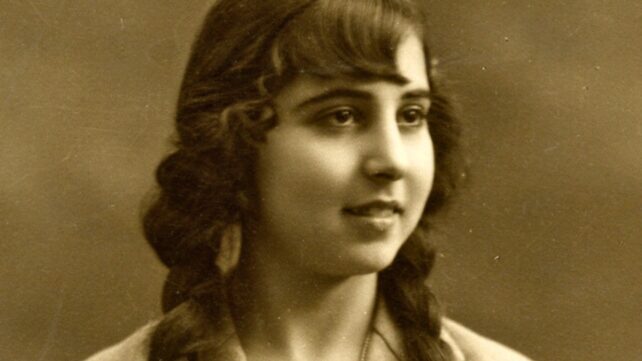 A sepia tone portrait of a young woman