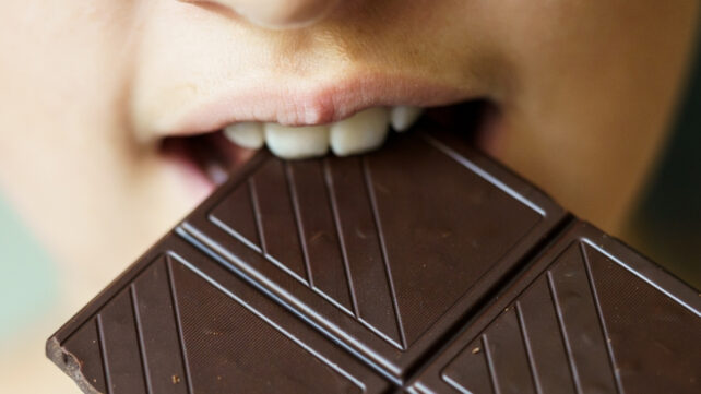 girl biting chocolate