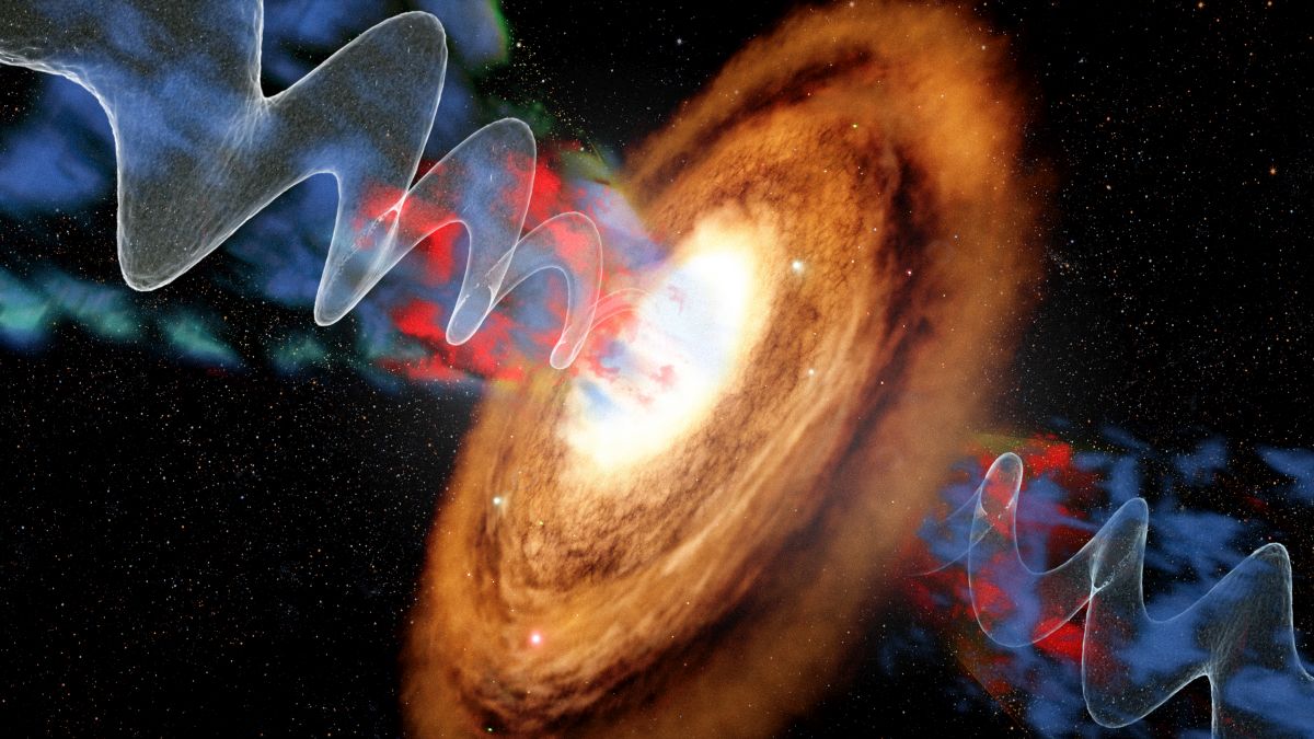Spiral Galaxy Caught Spraying Huge Jets of Super-Hot Gas Like a Sprinkler