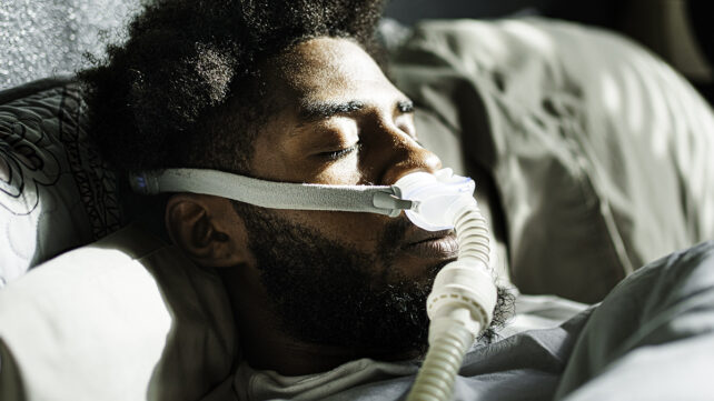 Man with a CPAP mask