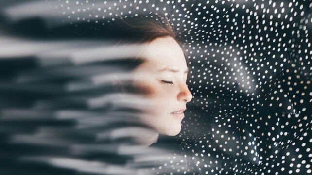 Woman in a flowing particle dress