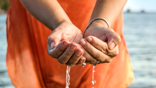 hands cupping water