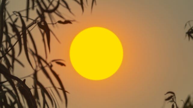 Bright yellow Sun in the sky