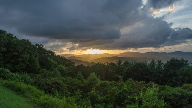A mountain range at sunset