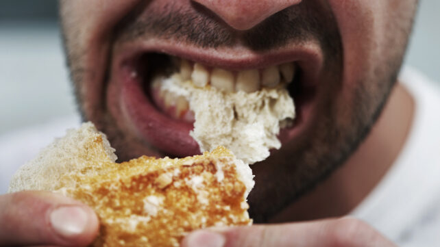 A man eating bread