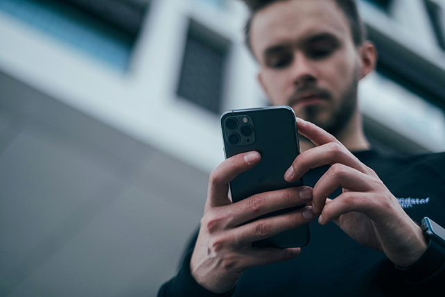 A person scrolling on their phone