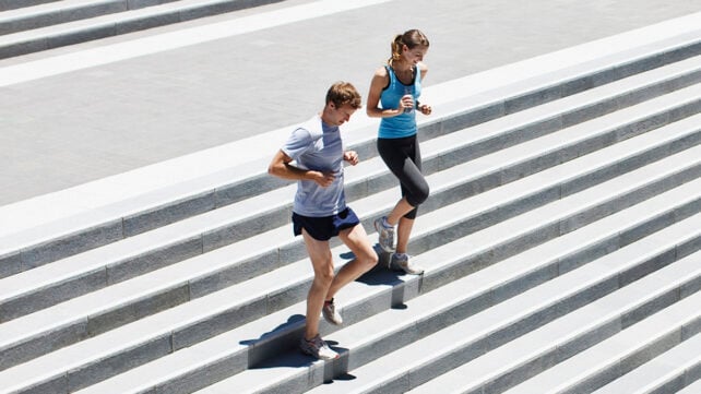Joggers on steps