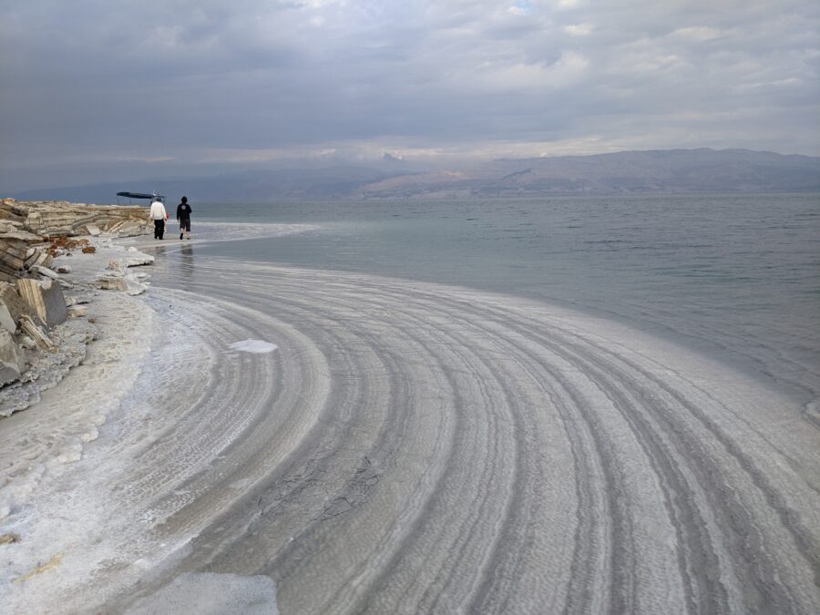 Recent salt deposits blanket the Dead Sea's retreating shoreline.