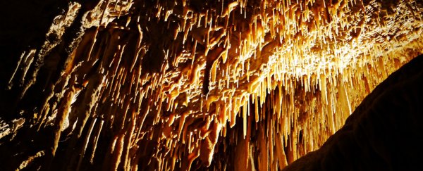 The echo of ancient wildfires could be buried in caves under your feet