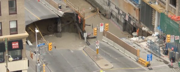 This gigantic sinkhole in Ottawa just took out a 4-lane road