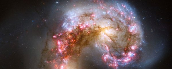Scientists just discovered a monster black hole formed by 3 colliding spiral galaxies