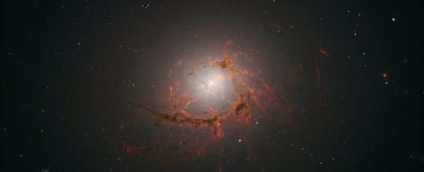 This galaxy is being destroyed from within by a supermassive black hole