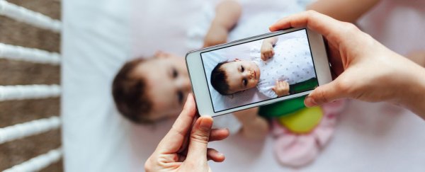 Here's why new mothers post so many baby photos on Facebook