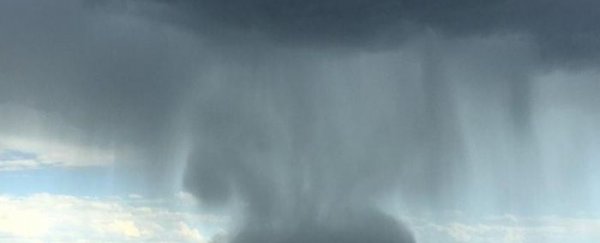 WATCH: A “rain bomb” drops on Queensland, Australia