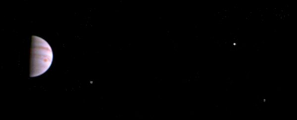 Juno just sent back its first photo of Jupiter and 3 moons