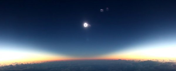 WATCH: This is what Tuesday's solar eclipse looked like from a plane window
