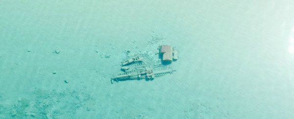 Lake Michigan is so clear right now, you can see its shipwrecks from a plane