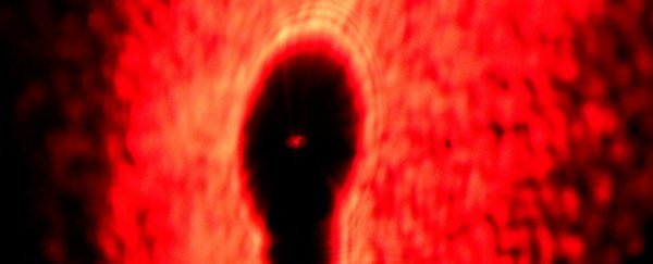 Watch: The crazy physics of why a shadow is brightest in the middle