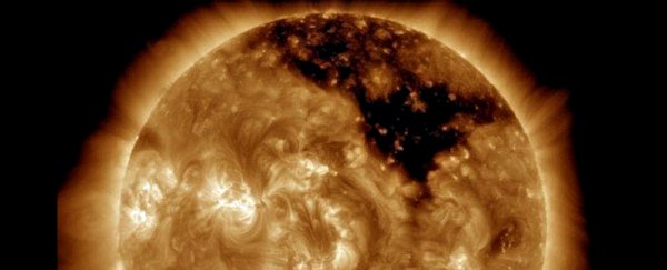 NASA just found a huge hole growing on the surface of the Sun