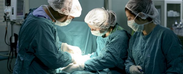 A tiny brain, skull, and hair have been extracted from a teen's ovary