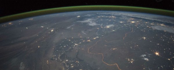 Aurora hunters have spotted a strange green 'airglow' hanging over Earth