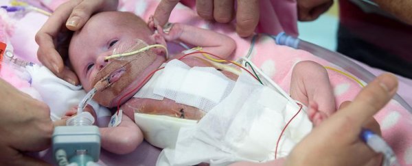 This baby was born with her heart outside the body and is surviving against all odds