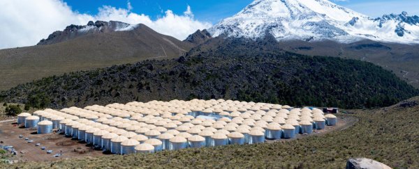 This weird experiment is bringing us closer than ever to solving a 100-year-old cosmic mystery