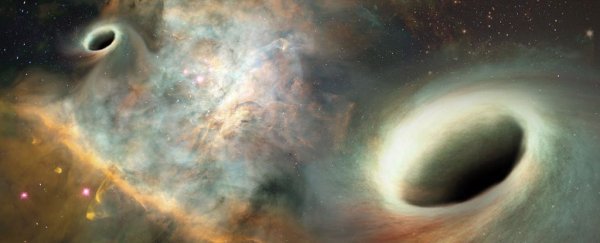Orbiting supermassive black holes have been observed for the first time