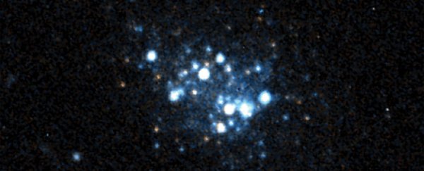 This distant blue galaxy contains the least amount of heavy elements ever detected