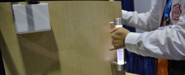 New invention stops the spread of bacteria on bathroom door handles